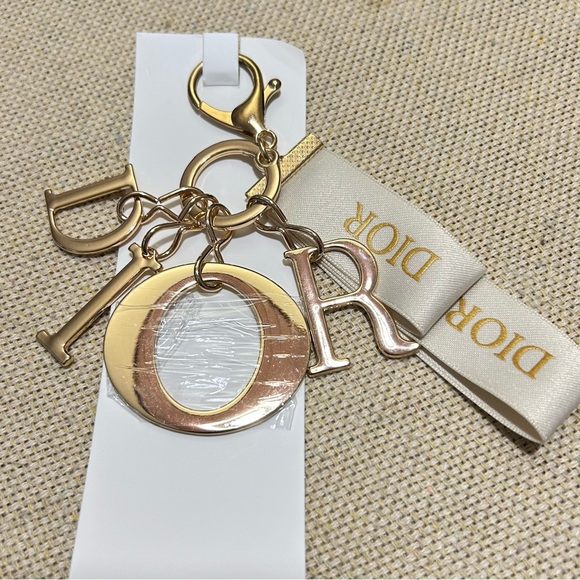 DIOR Gold VIP Keychain Bag Charm NIB - Picture 1 of 4